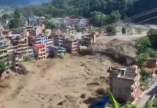 Race to get aid into Nepal and Tibet amid warnings flood lake could burst